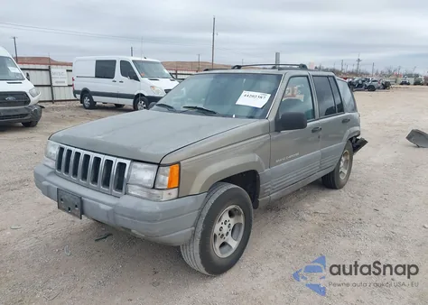 1997 Jeep Grand Cherokee Laredo/Tsi из США, поврежденный, VIN 1J4FX58S1VC735403